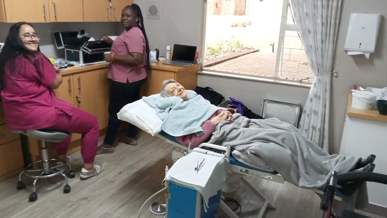 Our team visiting and caring for an elderly patient at their residence